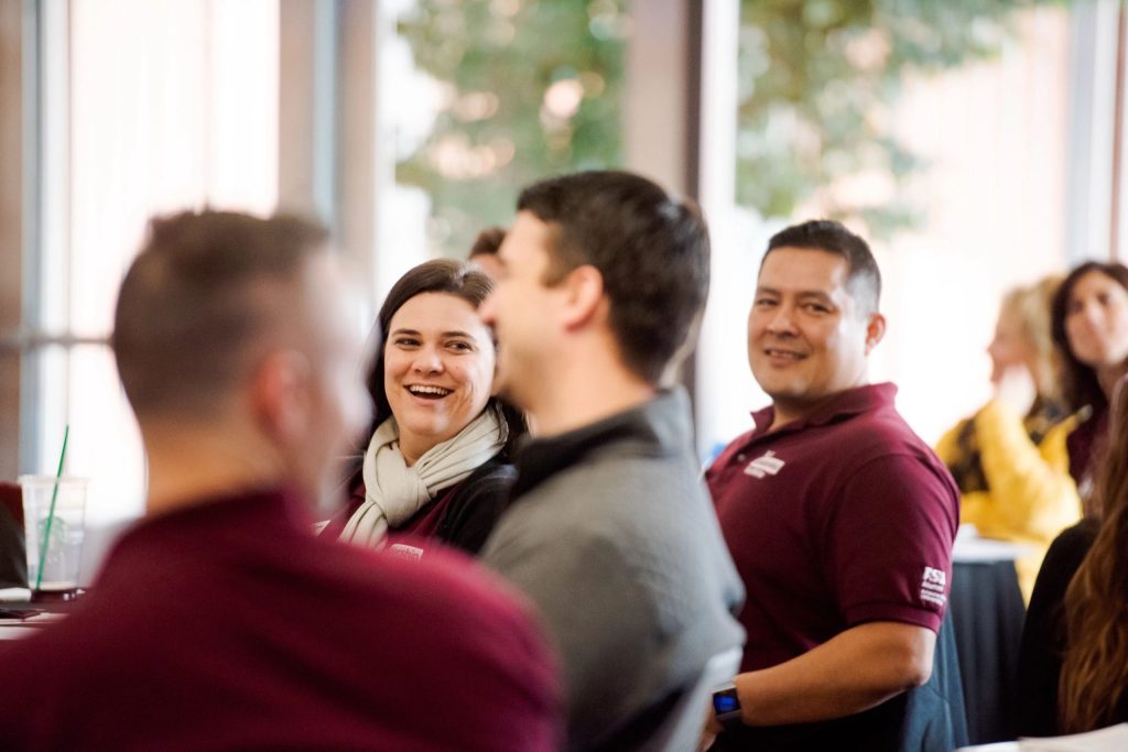 People laughing at ASU event