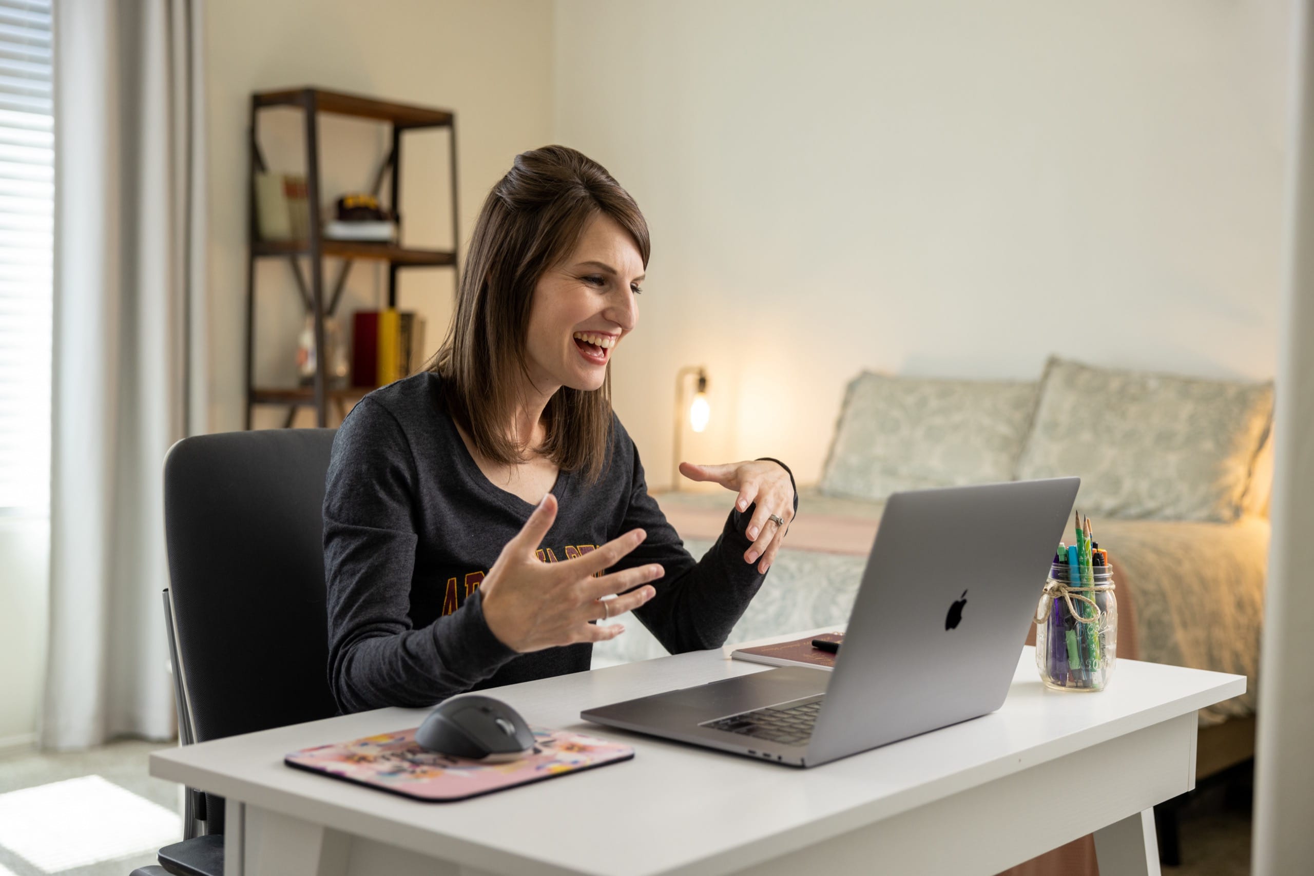 Women sitting at laptop for virtual meeting