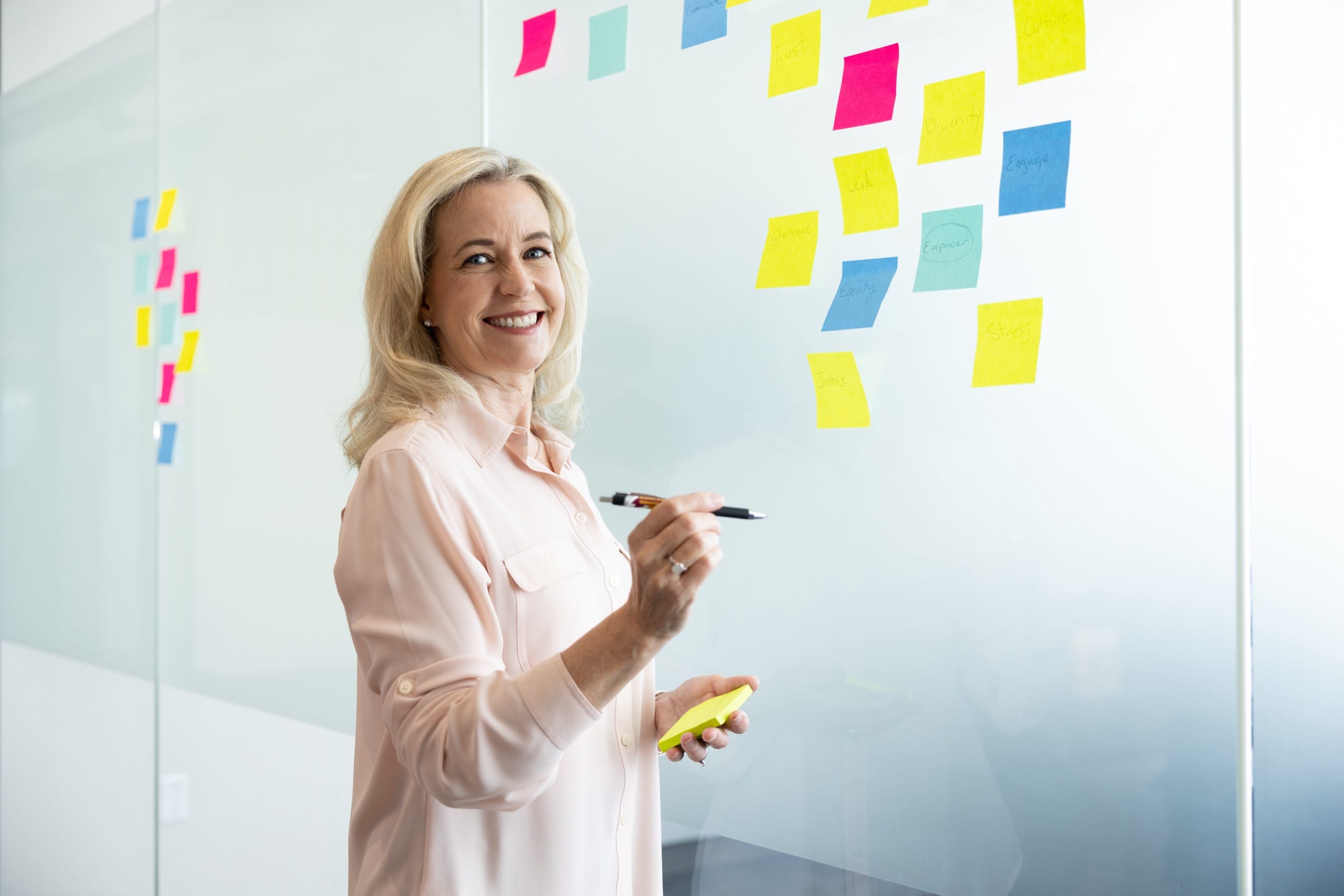 Woman brainstorming in a business meeting