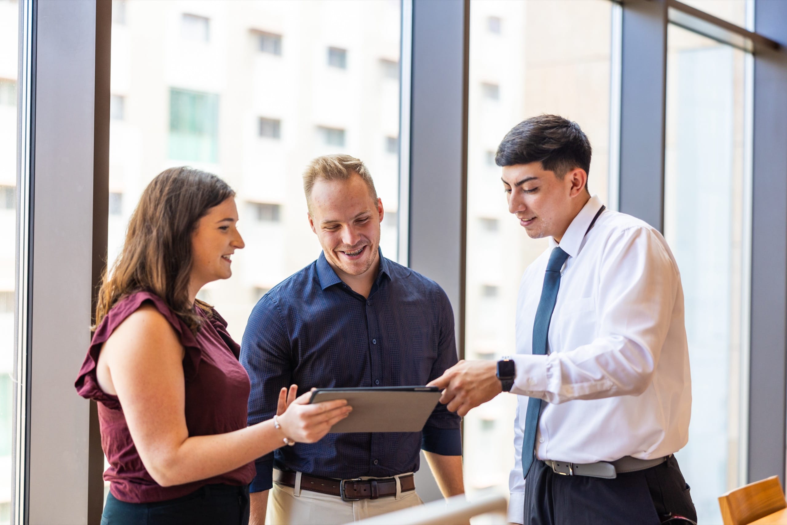 People speaking in office