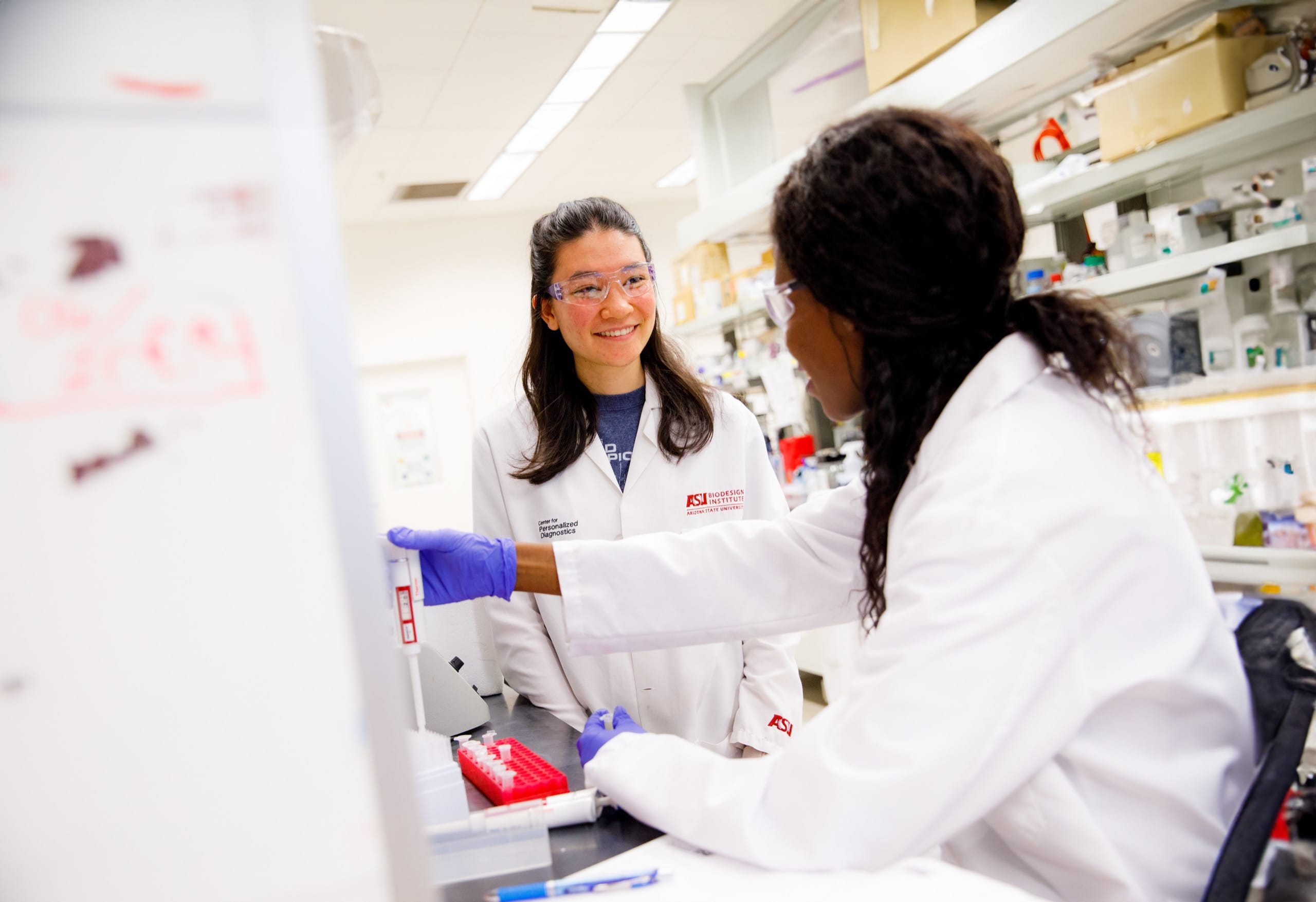 Female students in science lab