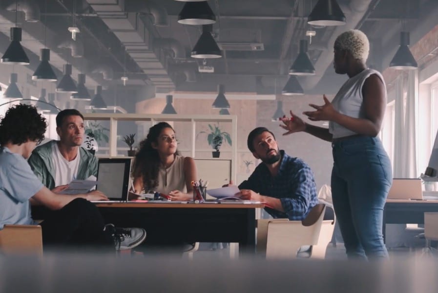 Workers sitting at table