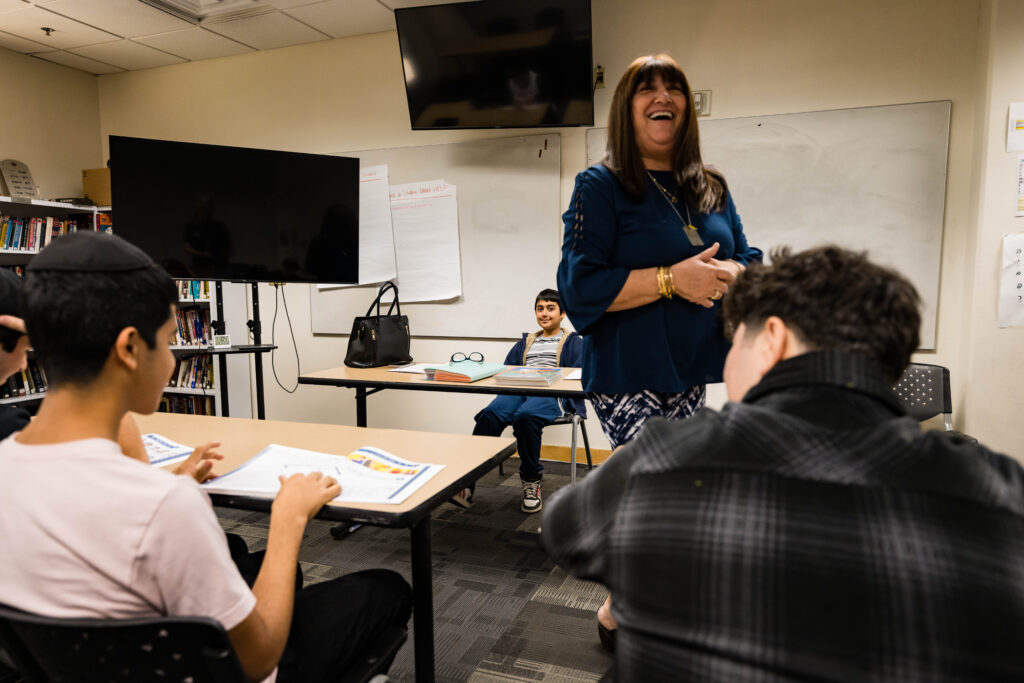 Teacher standing in front of students