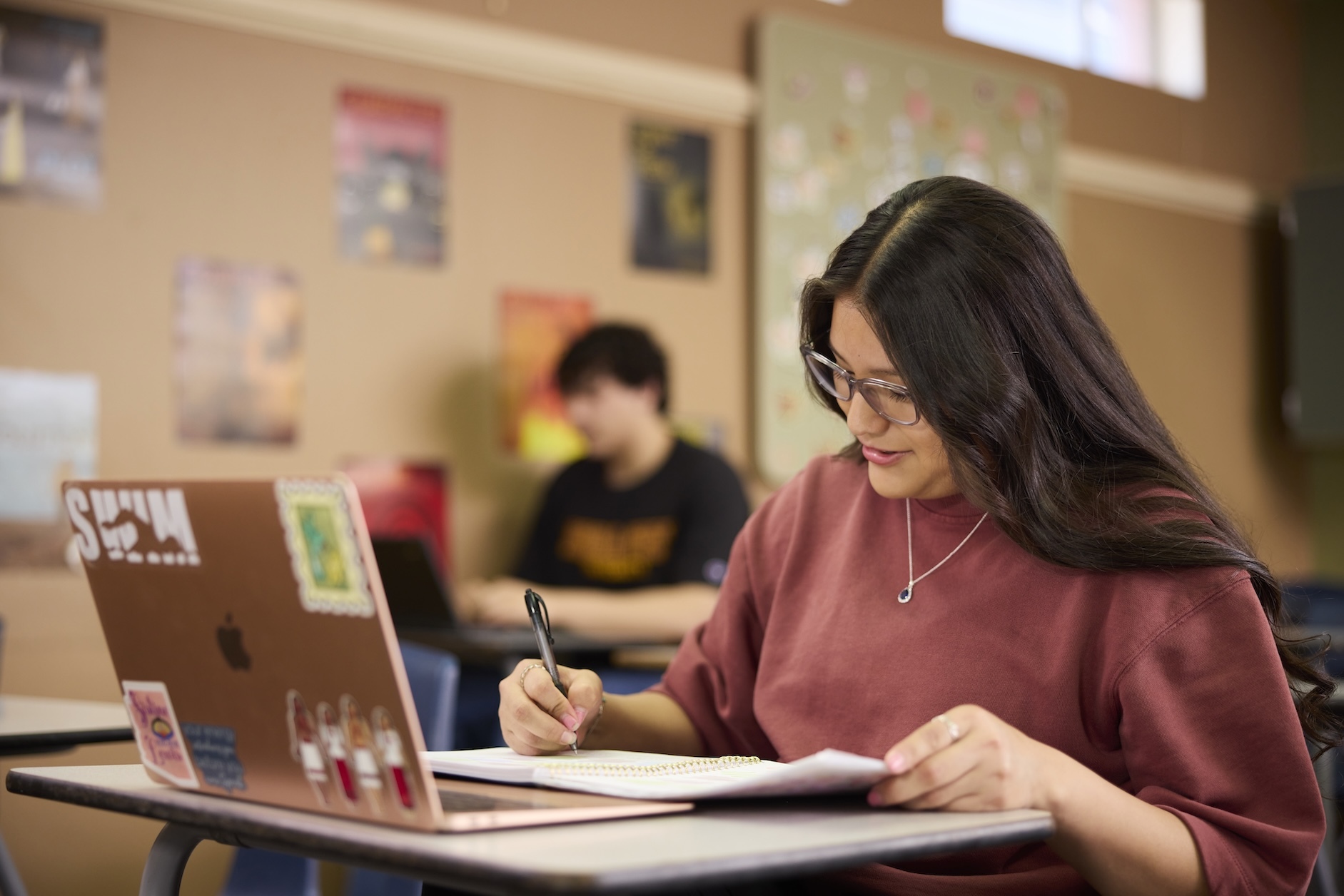 High school student studying in a classroom