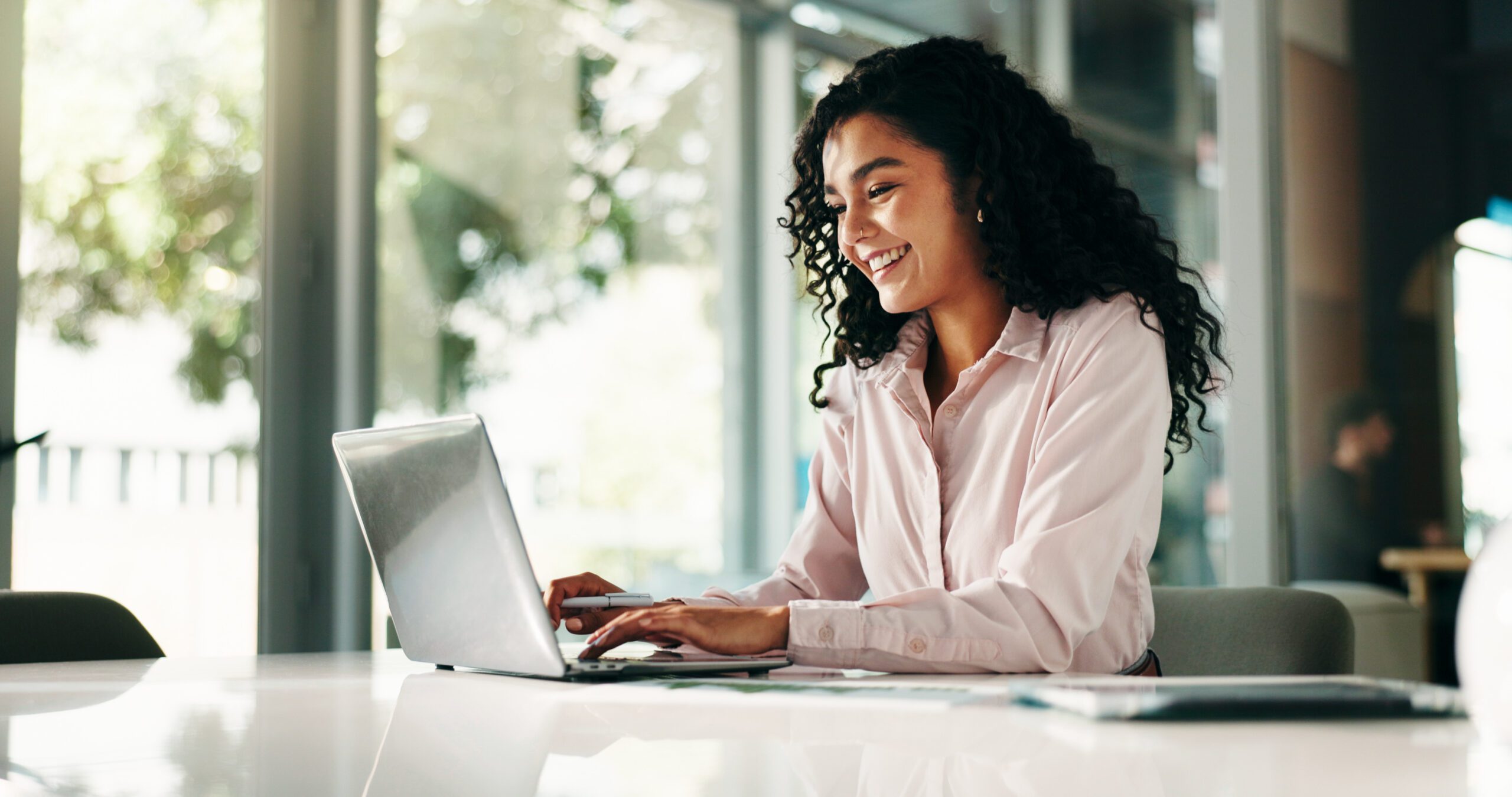 Woman at laptop in office