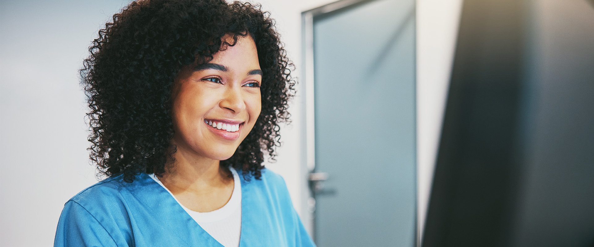 Woman in scrubs